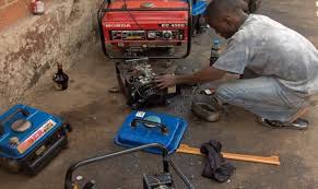 Man repairing a fuel generator